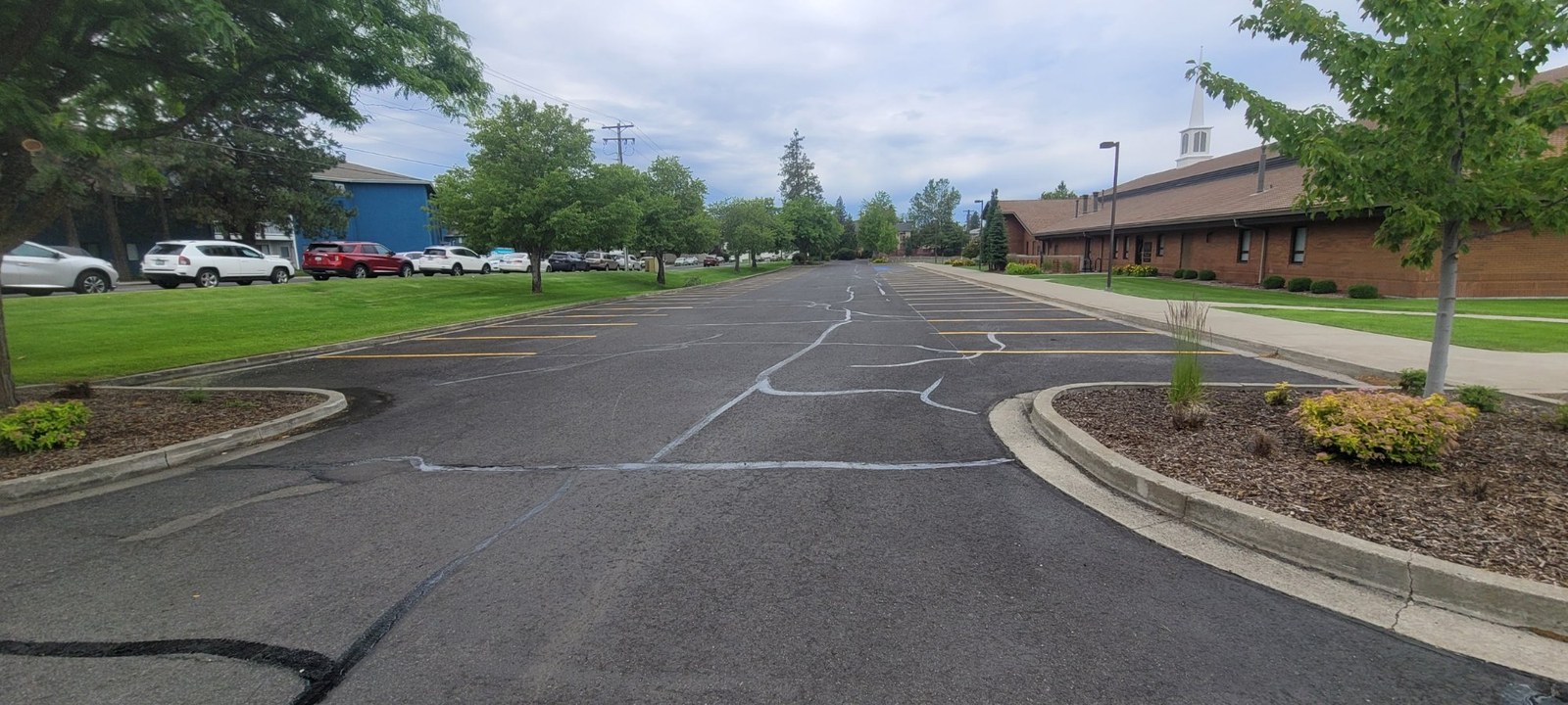 Hot-pour rubberized crack fill applied to commercial parking lot asphalt