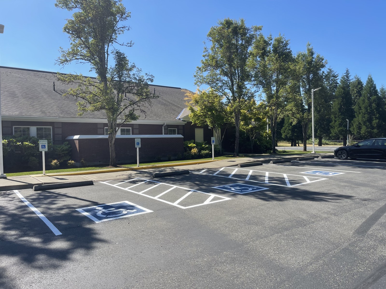 Fresh parking lot striping on commercial property, AC Moate Industries